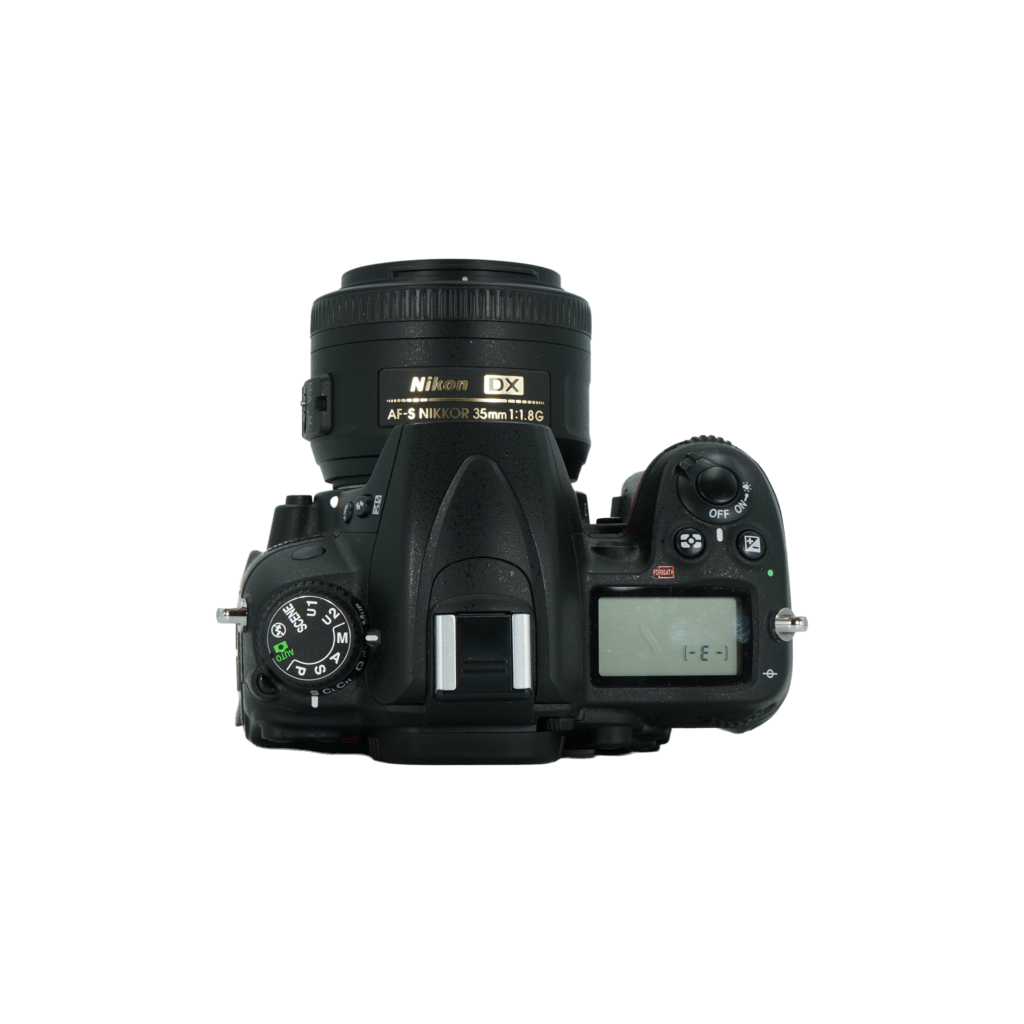 Nikon D7000 APS-C DSLR camera and Nikon 35mm f/1.8 G full frame DSLR lens